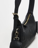 Valentino samba embossed logo shoulder bag with crossbody strap in black