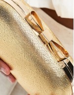 box clutch bag with bow clasp in gold