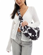 XL bumbag in black and white cow print