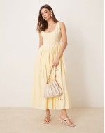 pleat detail shoulder bag with resin ball and knot strap detail in cream