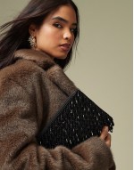 zip top clutch bag in all over beads in black