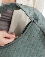 oversized woven shoulder bag in sage green