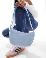 denim shoulder bag with logo in light blue