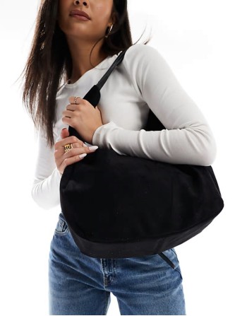 PASQ faux suede curved shoulder bag in black