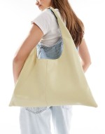 winged shoulder tote bag in pale green
